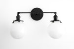 Load image into Gallery viewer, Lumio Globe Glass Globe Vanity Light - Modern Two Light Bathroom Sconce
