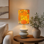 Load image into Gallery viewer, Liberty floral ceramic table lamp in a warm living room