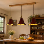 Load image into Gallery viewer, Brown triple pendant above a dining table