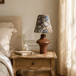 Cargar imagen en el visor de la Galería, Blue floral ceramic table lamp on a bedside table