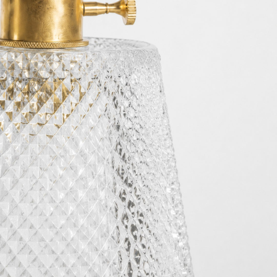 pressed glass texture and sealed brass rim detail