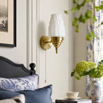 Bild in Gallery-Viewer laden, Antique brass white glass wall light in a bedroom scene