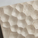 Load image into Gallery viewer, Carved stone relief face detail on a square travertine wall lamp