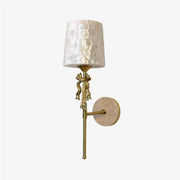 Beige Capiz shell bow wall sconce on a clean background