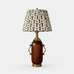 Load image into Gallery viewer, Deep brown vintage table lamp with yellow floral pleated shade on white background