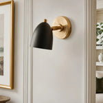 Charger l'image dans la visionneuse de galerie, Black and gold wall sconce on a refined wall