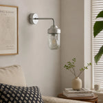 Load image into Gallery viewer, Aluminum glass wall sconce in a calm interior corner