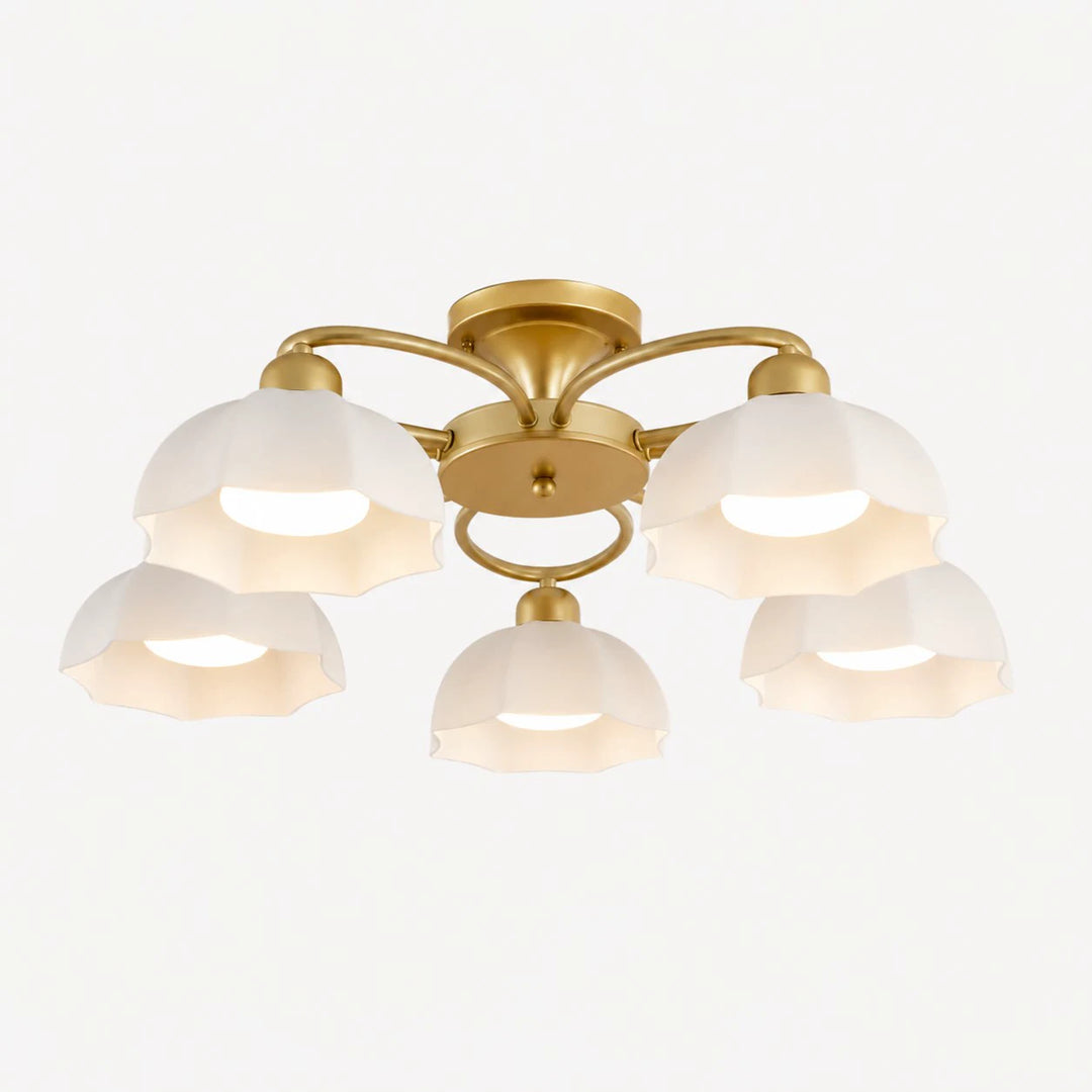 5-light brass ceiling fixture with white glass shades