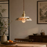 Bild in Gallery-Viewer laden, Ceramic pendant lamp in a warm tea-room setting with wall art background