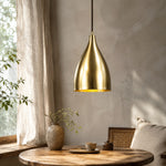 Load image into Gallery viewer, Bright brass pendant light above a round table near a window