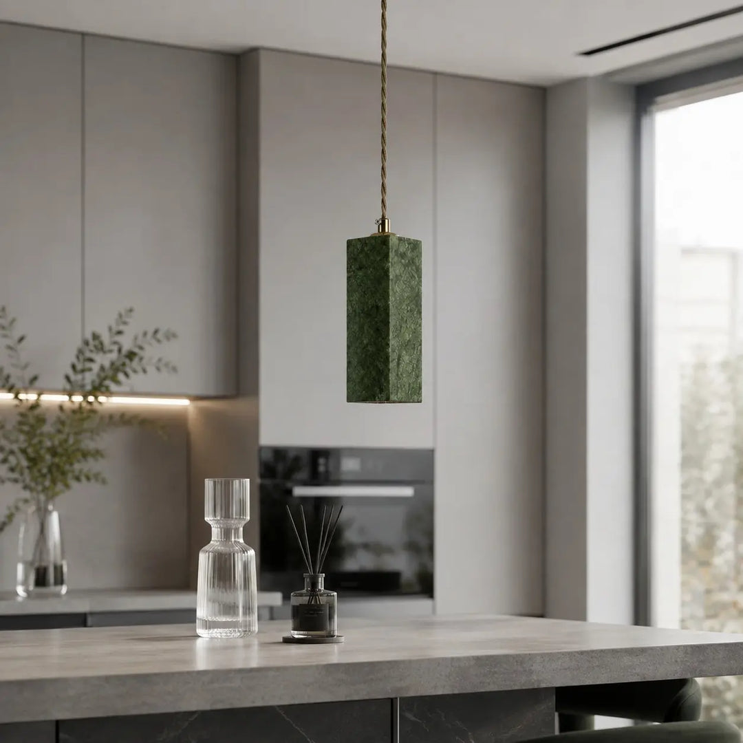 Green jade pendant light in a modern kitchen