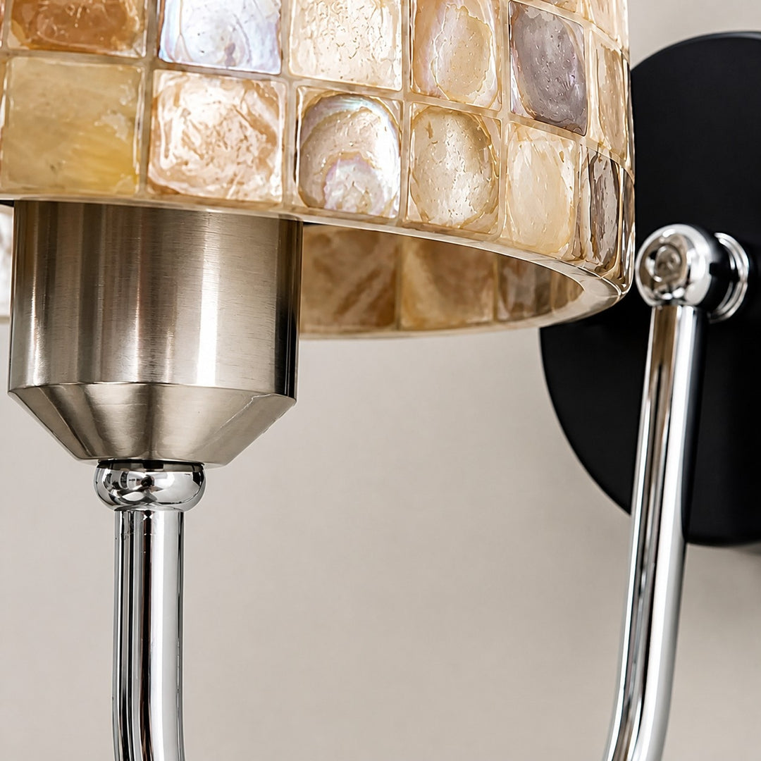 Close view of capiz shell shade with chrome socket detail