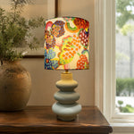 Bild in Gallery-Viewer laden, Sculptural ceramic base and floral fabric shade table lamp