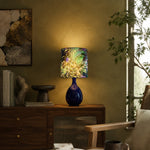 Load image into Gallery viewer, Green botanical fabric ceramic table lamp on a console table