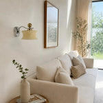 Charger l'image dans la visionneuse de galerie, Cream glass wall lamp above a sofa