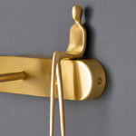Cargar imagen en el visor de la Galería, Brass wall plate with decorative figure