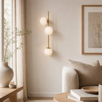 Load image into Gallery viewer, Decorative wall sconce in an elegant interior setting