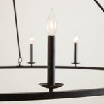 Cargar imagen en el visor de la Galería, Lámpara de araña con forma de rueda de carro de Rowan Candle - Iluminación rústica con ruedas redondas
