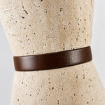 Bild in Gallery-Viewer laden, Close view of natural travertine texture and solid wood band