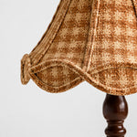 Bild in Gallery-Viewer laden, Close view of the patterned fabric shade and scalloped trim