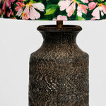 Bild in Gallery-Viewer laden, Close-up of brass stem connection between floral shade and ceramic base