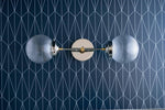 Load image into Gallery viewer, Lumio Globe Versatile Vanity Sconce - Dimmable Light for Bathroom and Hallway Use
