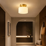 Charger l'image dans la visionneuse de galerie, Low-profile brass ceiling light illuminating a corridor
