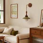 Charger l'image dans la visionneuse de galerie, Wabi sabi wall sconce installed beside a sofa and wooden cabinet in a calm living room