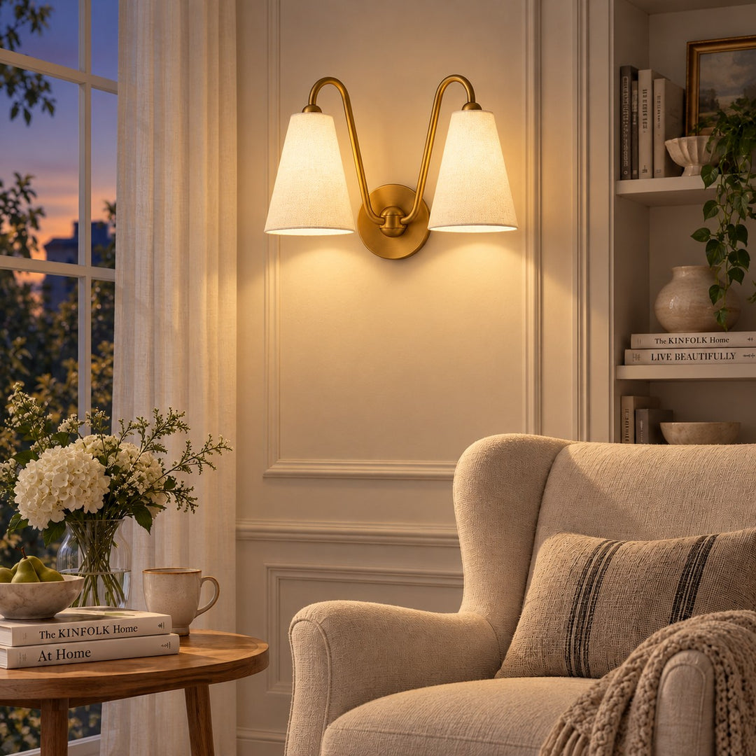 Living chair with white linen shades, lights on