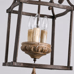 Load image into Gallery viewer, Close view of E14 candle sockets inside the rustic birdcage pendant lamp