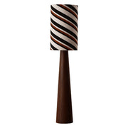 Striped fabric floor lamp with tapered wood grain base on white background