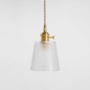 Style B textured glass shade with antique brass E27 socket, front view