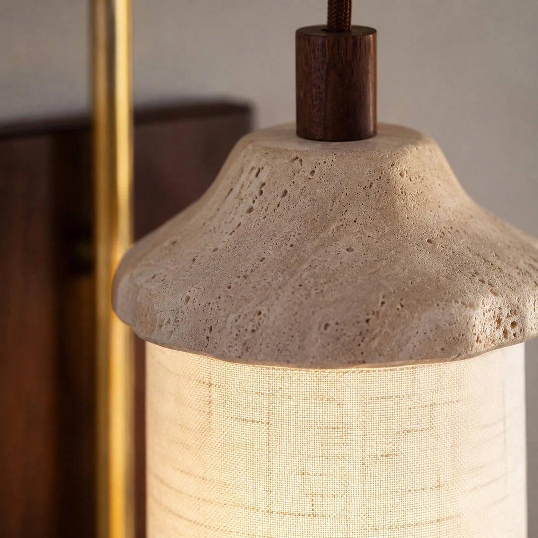 Travertine stone and fabric shade close detail