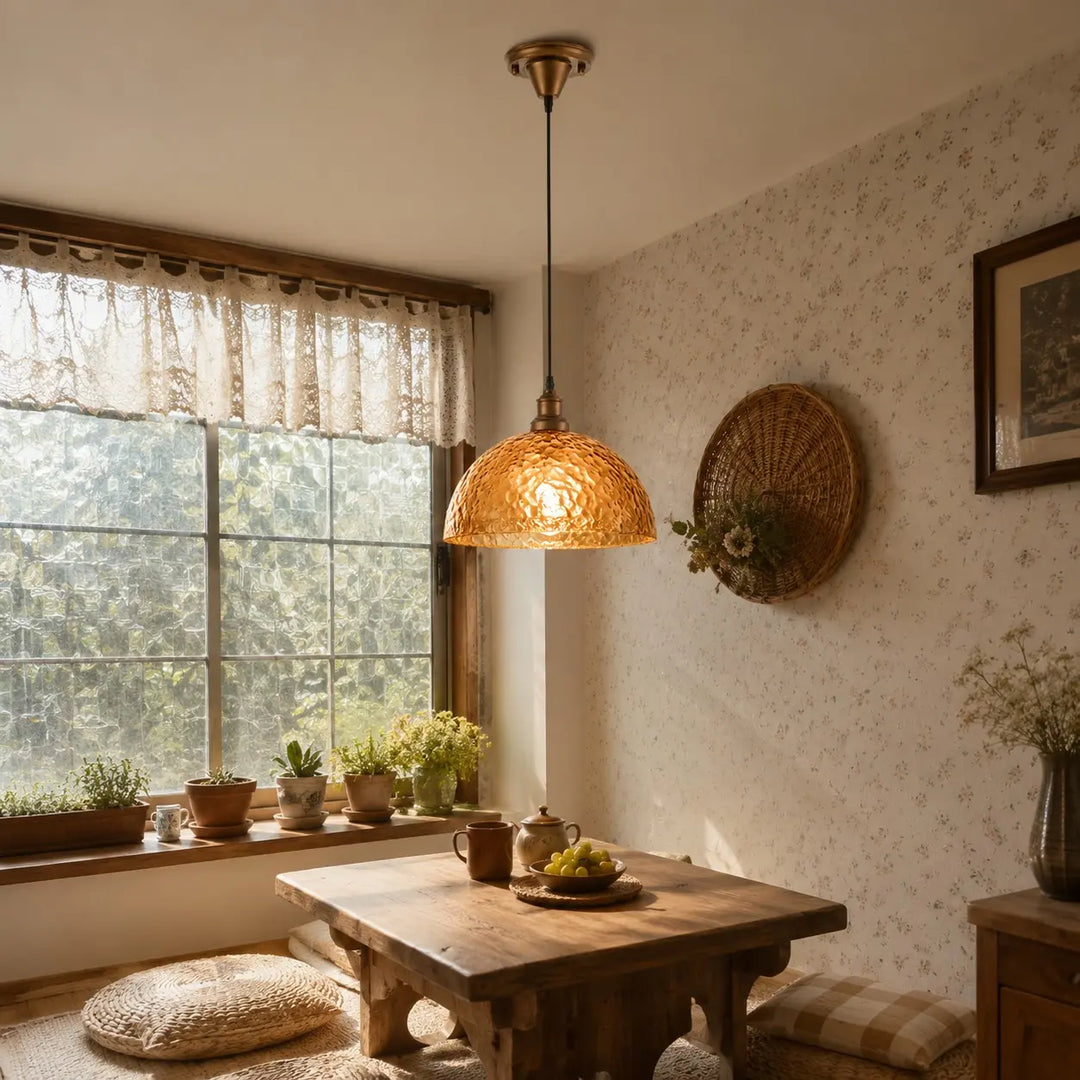 Amber pendant light in a breakfast nook