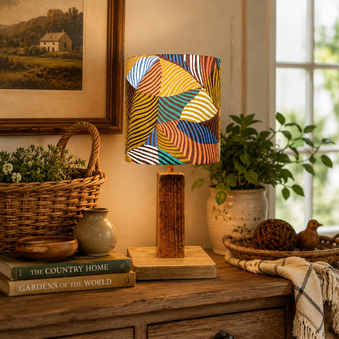 Colorful printed fabric table lamp in a styled interior