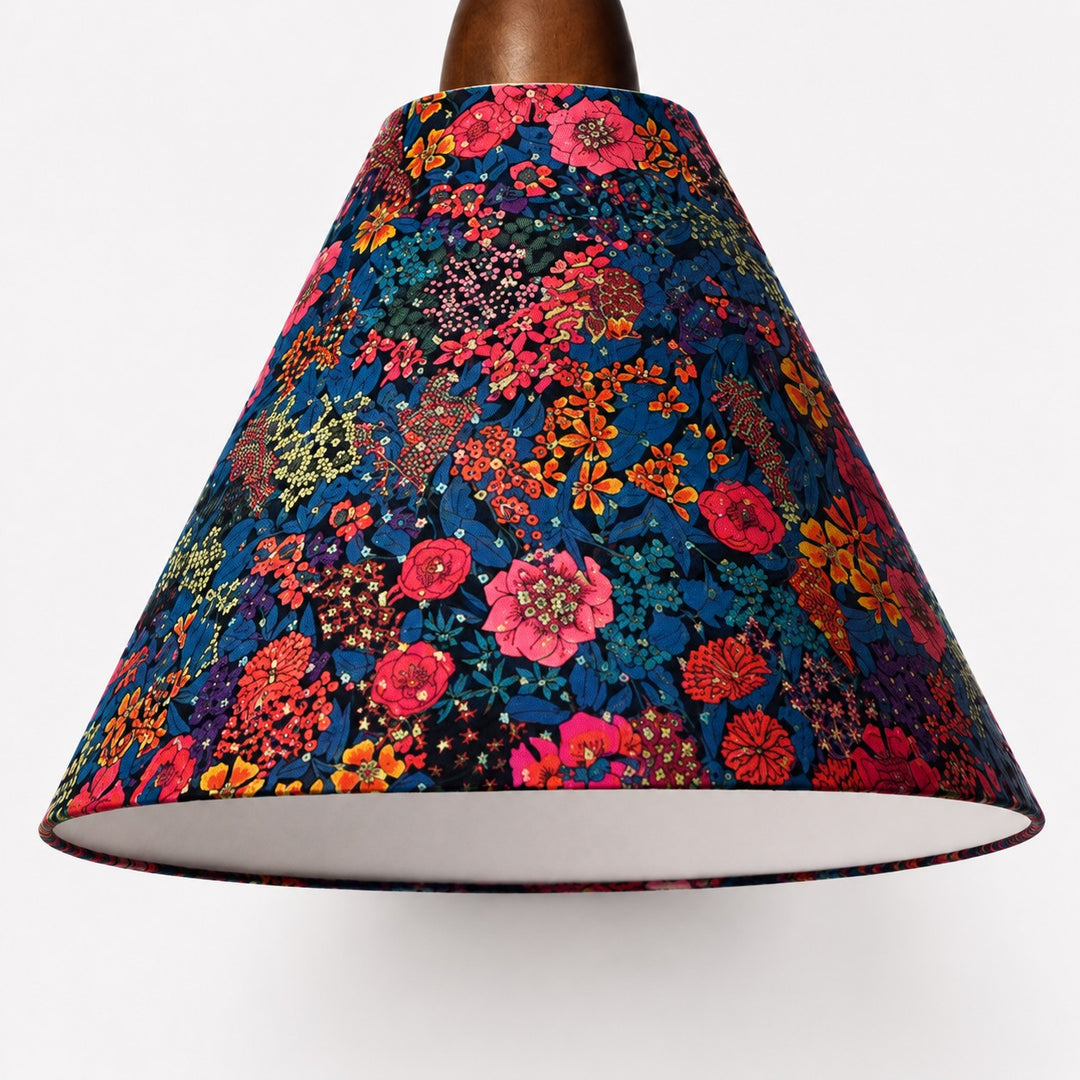 Close-up of dense botanical Liberty fabric texture and finished shade edge