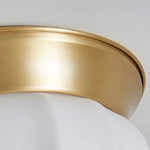 Load image into Gallery viewer, Close view of the brushed brass canopy and opal glass shade