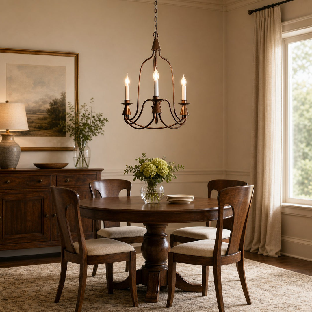 Antique bronze three-light candle chandelier in a warm dining room
