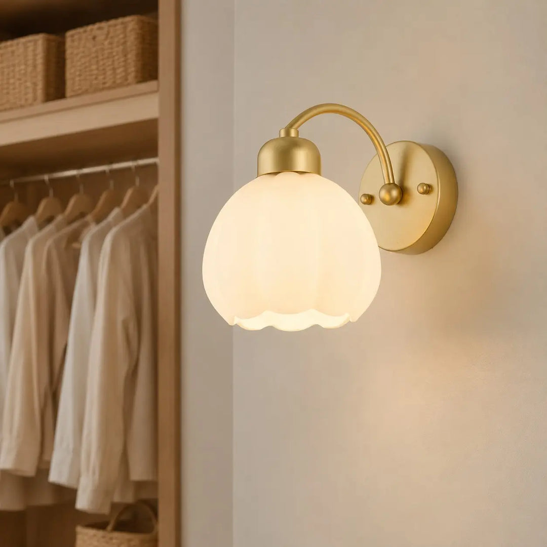 Milk glass flower wall lamp in an elegant dressing area