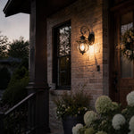 Load image into Gallery viewer, Outdoor wall lantern beside a stone entry wall
