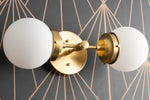 Load image into Gallery viewer, Lumio Globe Modern Geometric Sconce - Two Light Bathroom Vanity Lighting
