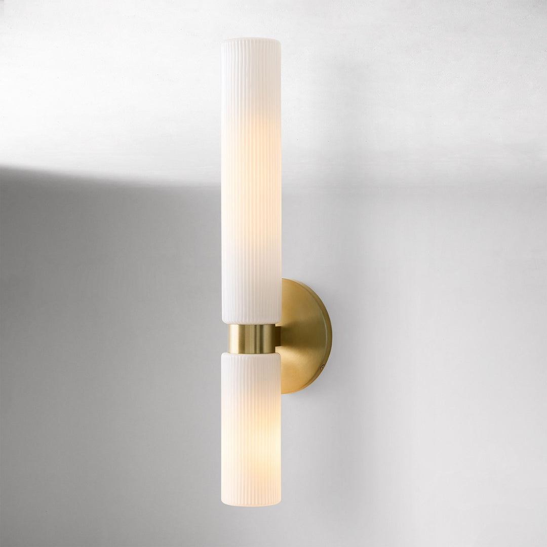 Applique murale Rivora en tube de verre strié – Luminaire double tube en laiton cannelé