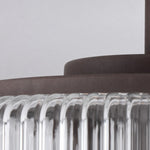 Load image into Gallery viewer, Close-up of metal canopy and ribbed glass edge