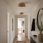 Load image into Gallery viewer, Amber glass flush-mount ceiling light in a bright hallway