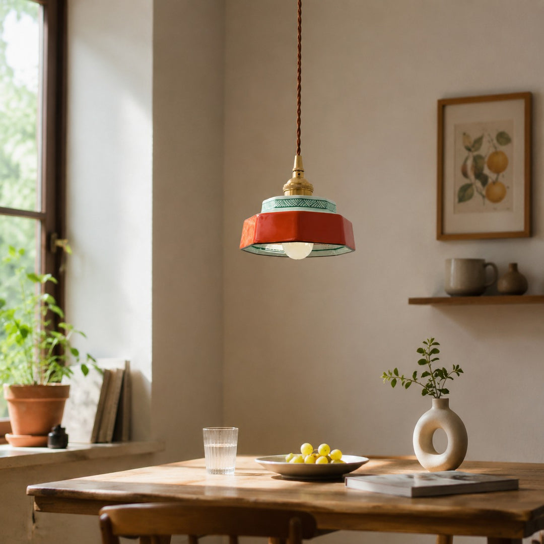 red plum ceramic pendant light in a dining room