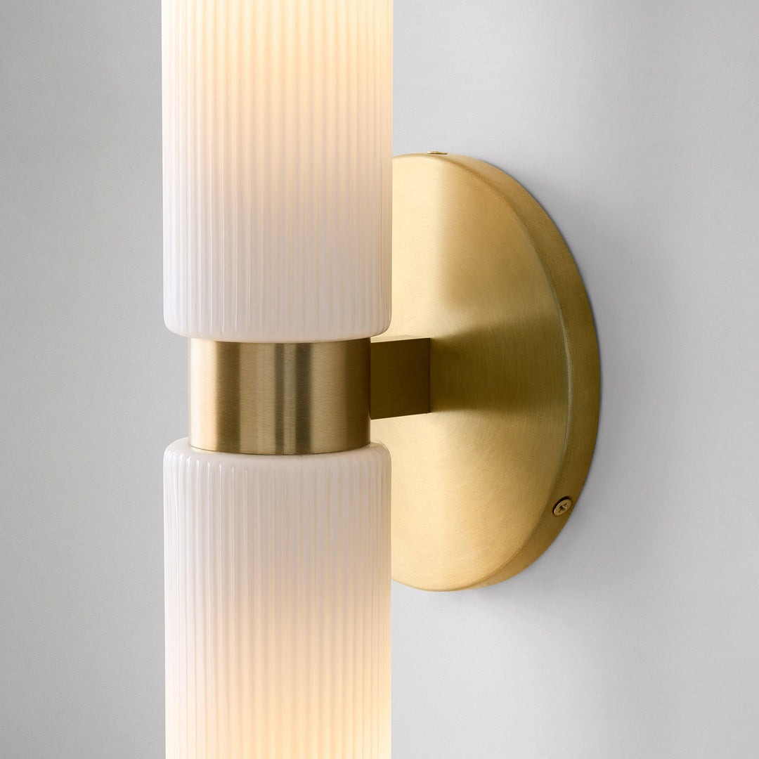 Applique murale Rivora en tube de verre strié – Luminaire double tube en laiton cannelé