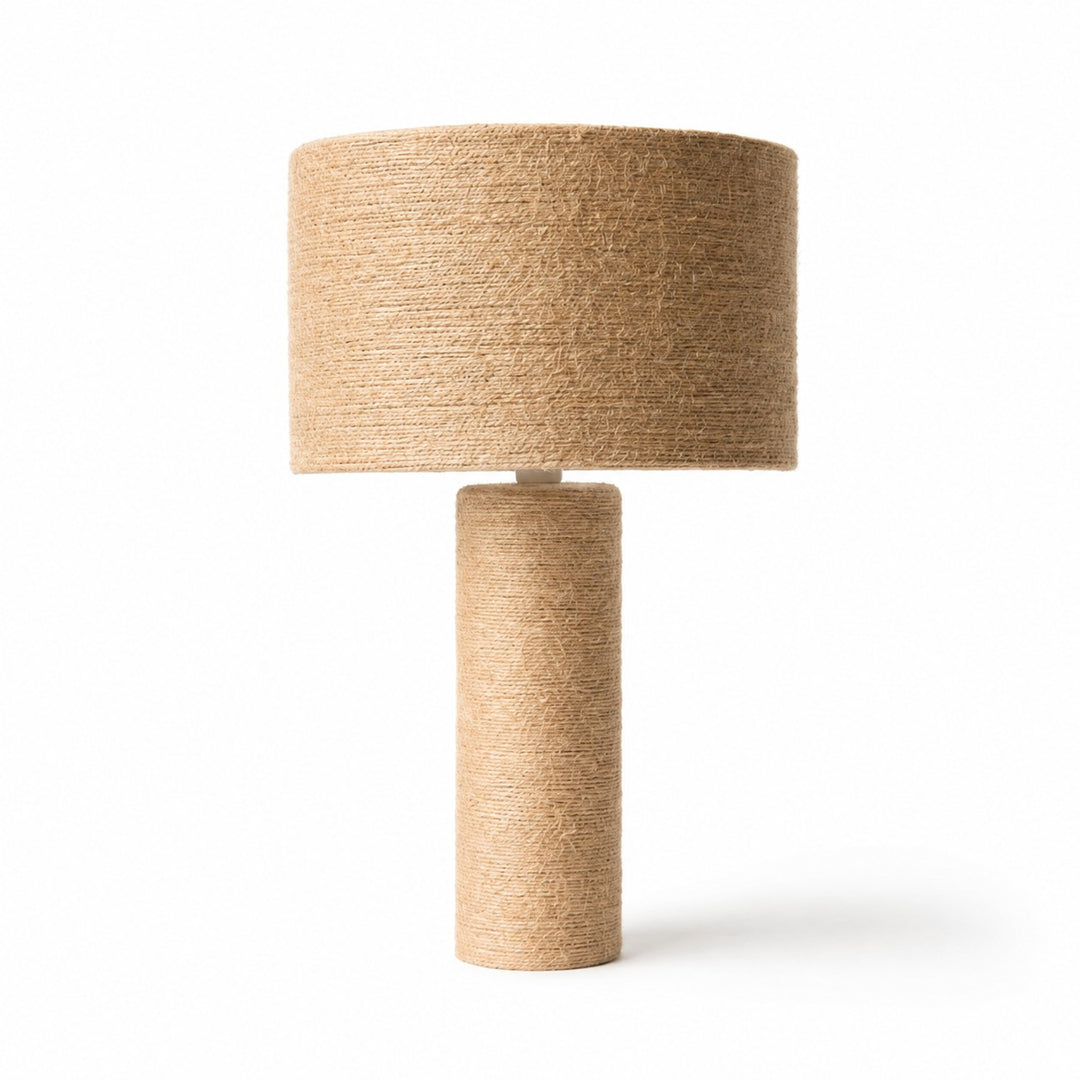 Woven jute cylinder table lamp on a white background