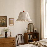 Load image into Gallery viewer, Pleated pendant light in a warm bedroom corner