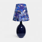 Load image into Gallery viewer, Blue floral fabric ceramic table lamp on plain background