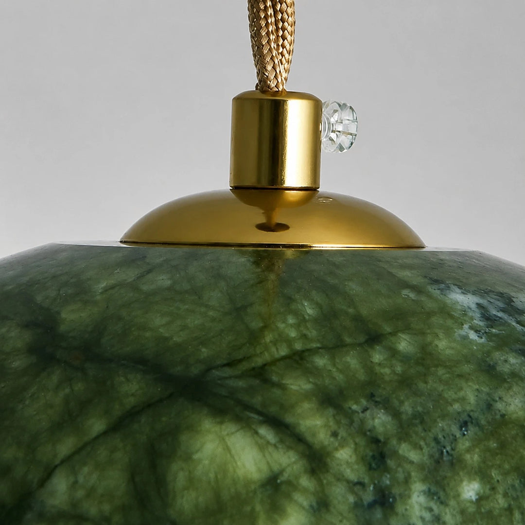 Close view of the brass-tone shade fitting